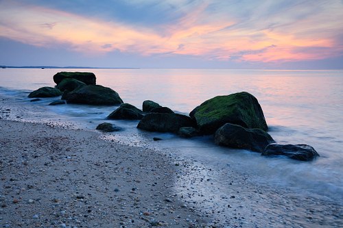 Sea and shore in evening light.