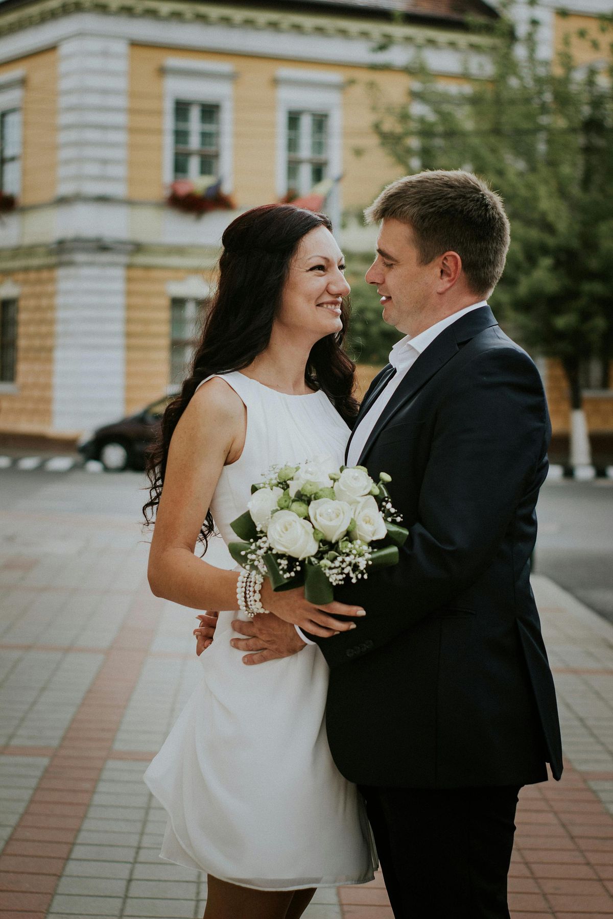 Bride and groom sharing a moment on their wedding day.