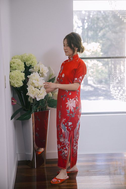 Chinese bride getting ready for traditional tea ceremony