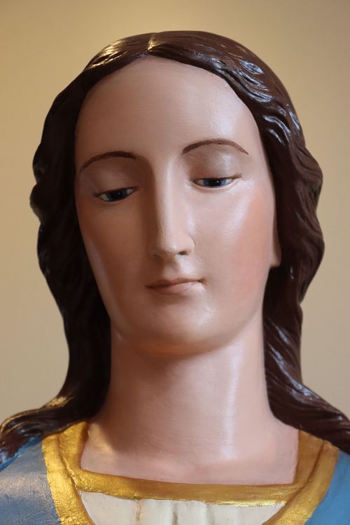 Mary statue's face restored