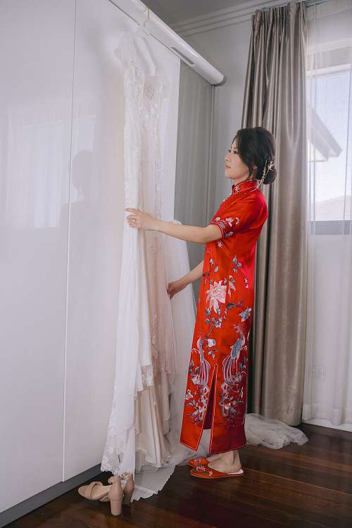 Chinese bride getting ready for traditional tea ceremony