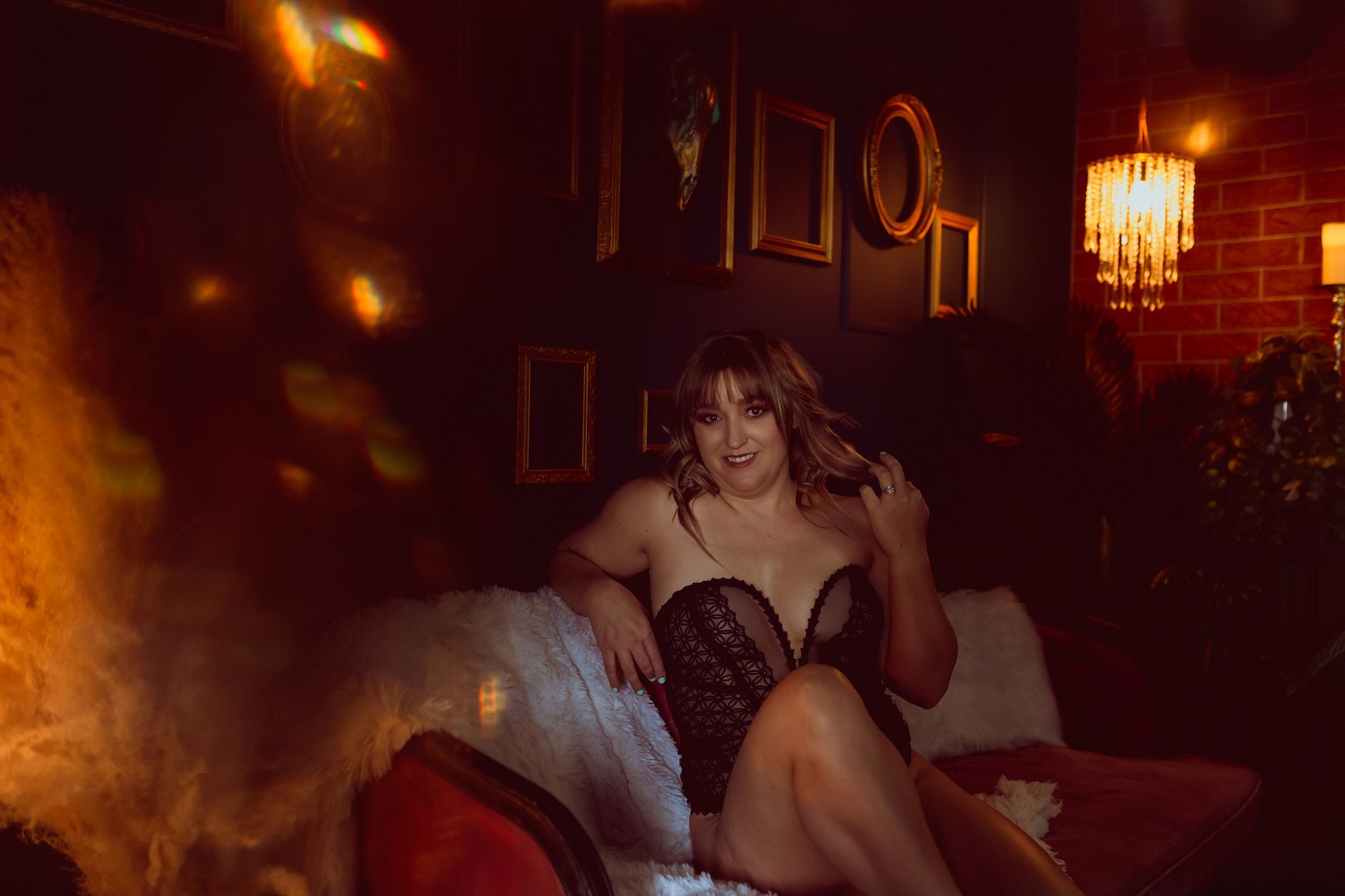 Intimate boudoir photography session in cozy private studio located in Willcox, Arizona, featuring professional hair and makeup styling, curated wardrobe selections, and a personalized experience for women traveling from Tucson, Sierra Vista, Tombstone, a