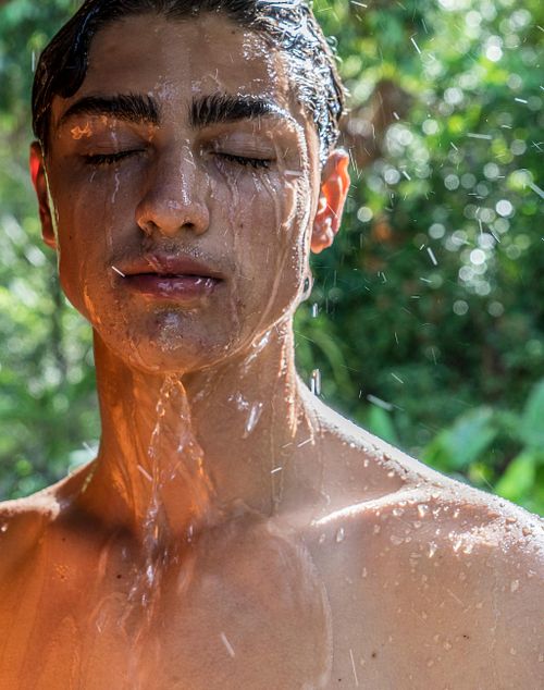 Oliver takes a shower.