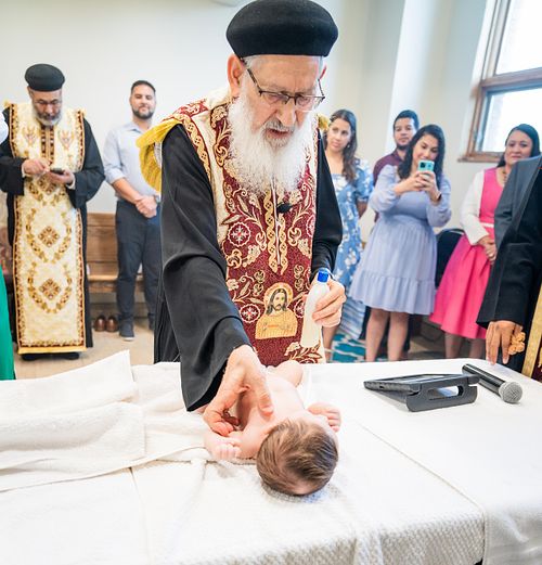 baby baptism ceremony at Ottawa church captured by Kameel Photography