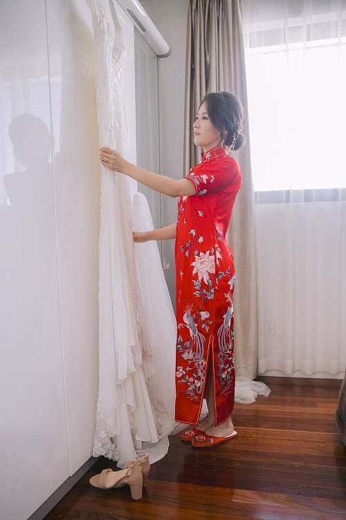 Chinese bride getting ready for traditional tea ceremony