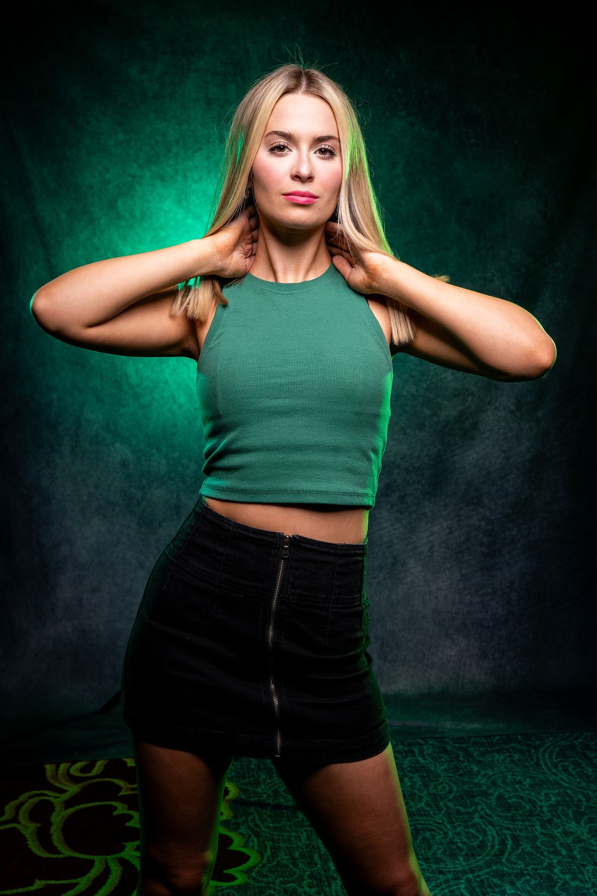 High school senior posing outdoors with natural light.