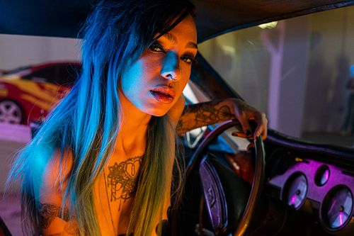 Close-up editorial portrait of Fawn Winters topless in a Mercury Cougar — digital lifestyle portrait by David Andrade, Las Vegas
