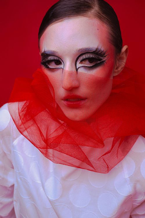 Portrait of subject with avant-garde styling, fashion photography by Mila Filippone.