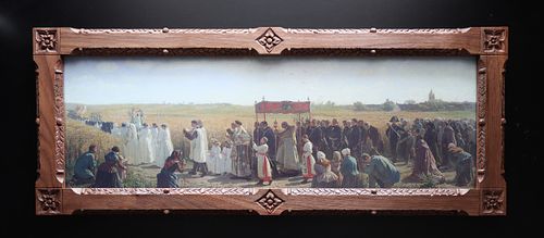 a custom hand-carved walnut picture frame with gothic design elements