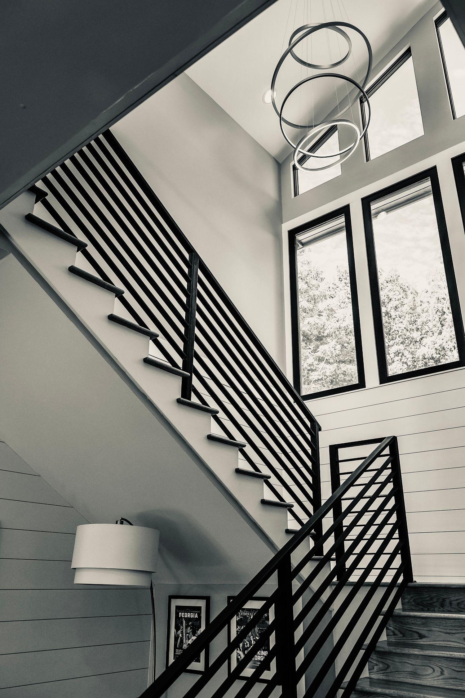 Black and white view up stair