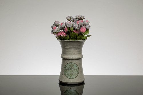 Decorative vase with pink and purple flowers, perfect for home decor