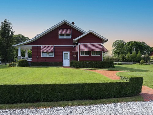 Striped Awnings on Cape Cod Home.