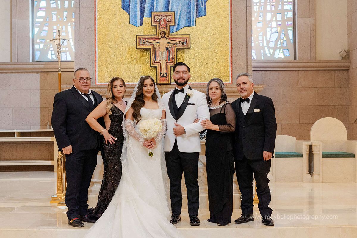 Exchanging vows at Saint Joseph, Husband of Mary Roman Catholic Church in Las Vegas Wedding Photography