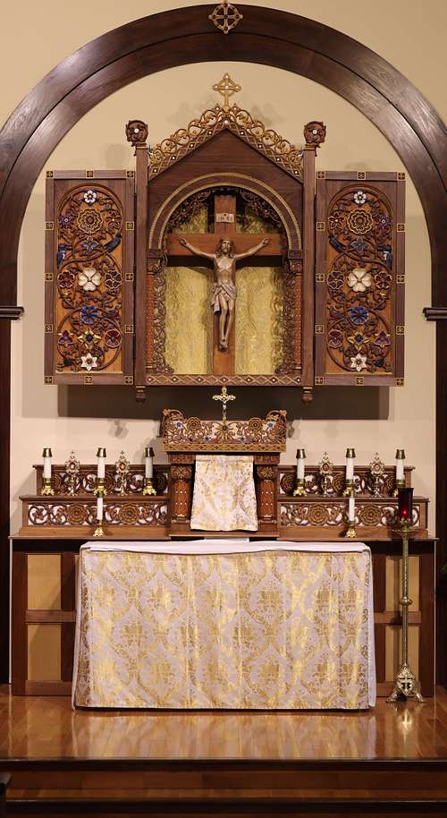 A beautifully hand-carved high altarpiece for St. Bernadette Catholic Church in Lancaster, Ohio