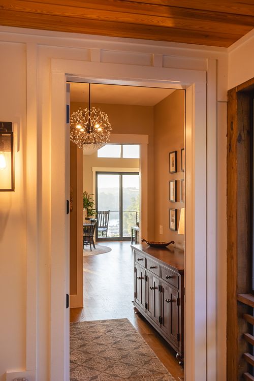 View to lake from breezeway through the doorway