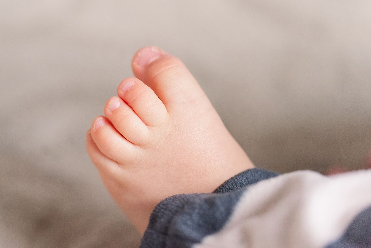 up-close of a baby's toes curling up, in Cranberry Township, PA