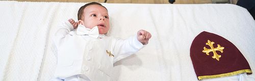 baby baptism ceremony at Ottawa church captured by Kameel Photography