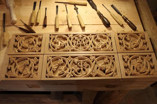 custom hand-carved shelves with Mary and St. Joseph's monograms