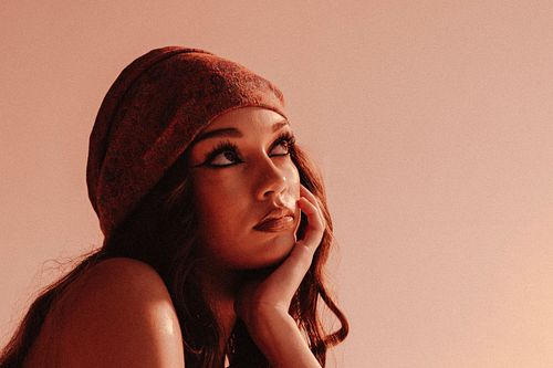 Creative portrait of model in artistic lighting, editorial fashion by Mila Filippone.