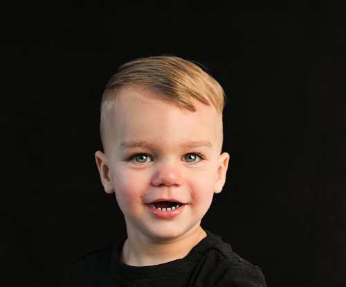 kinderportret met zwarte achtergrond