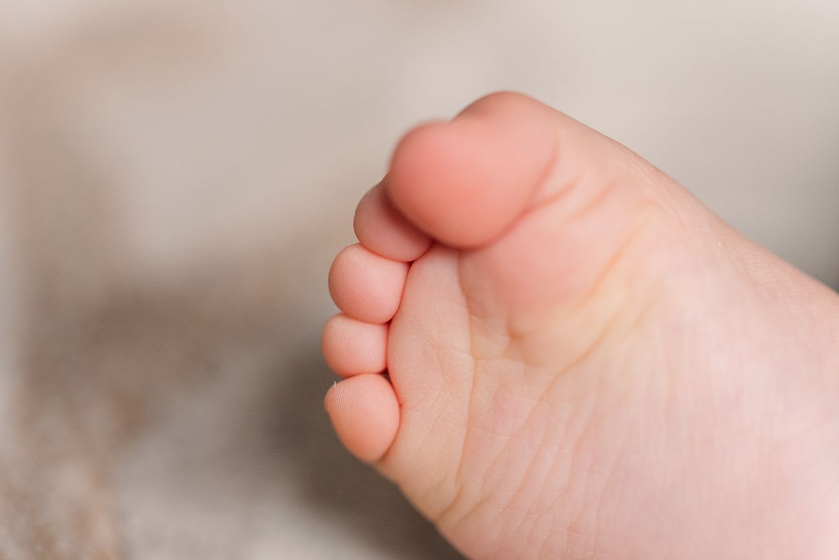 up-close of baby foot with curled toes, in Cranberry Township, PA