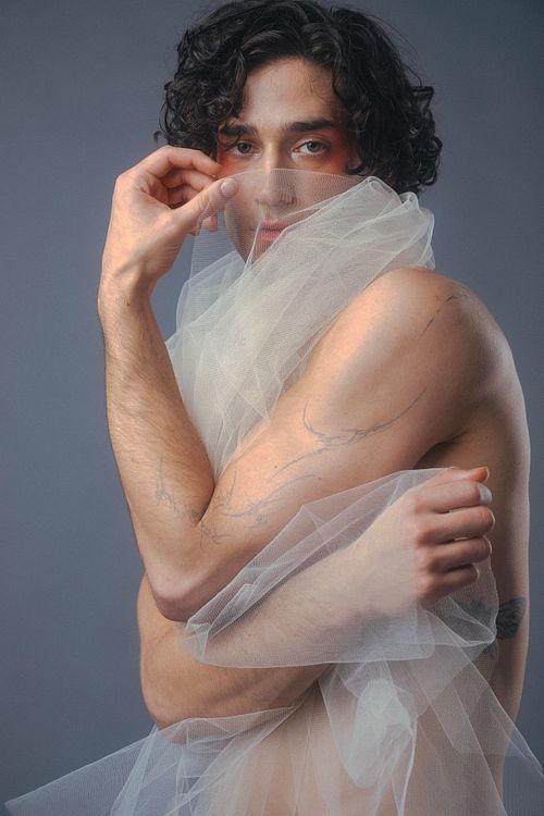 Creative portrait of model in artistic lighting, editorial fashion by Jamila Filippone.