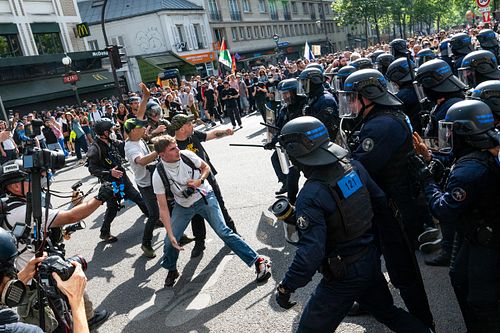 French police clash with May Day protesters as tens of thousands march in Paris, France.