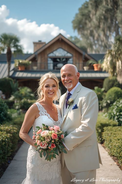 A mature bride and groom smiling together in front of a rustic estate home during a luxury farm wedding in Ocala, FL.