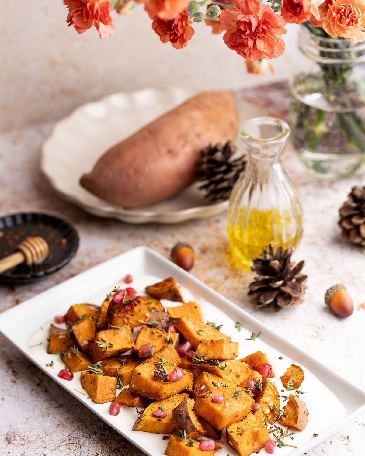 Roasted potatoes plated on a rectangular platter