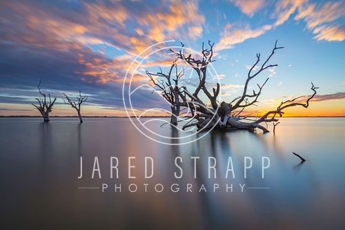 a photo of sunset at lake bonney south australia
