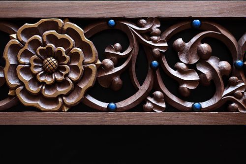 Hand carved panel with vines and a rose in walnut by Wes Baker for high altar at St. Bernadette Catholic Church in Lancaster, Ohio