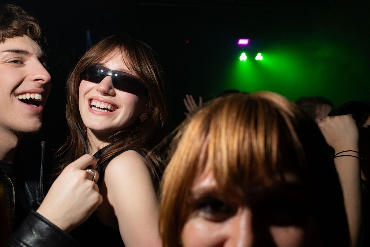 girl looking oddly at camera on Vancouver dance floor