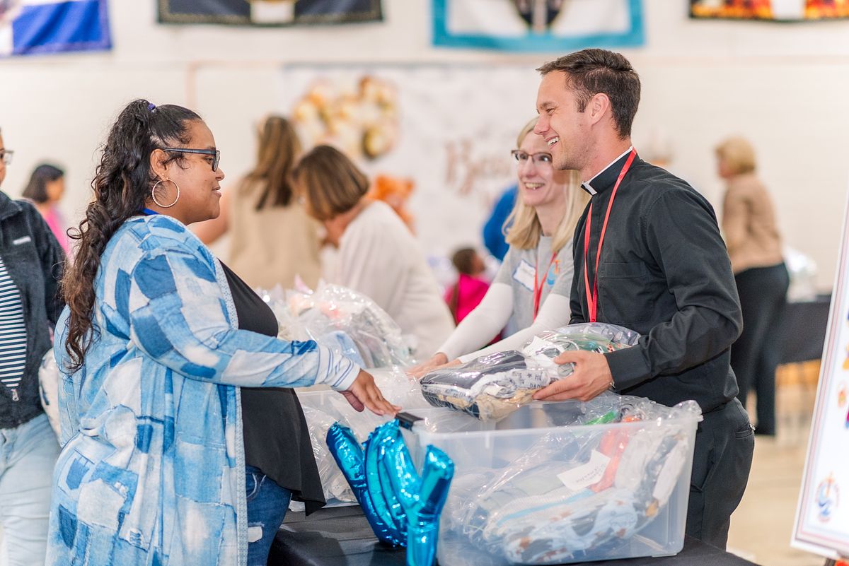 Holy Redeemer Community Baby Shower gifting moms by Cranberry Township, PA newborn photographer